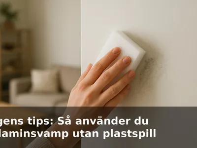 Hand som gnuggar bort ett svart skomärke på en vit vägg med en melaminsvamp.